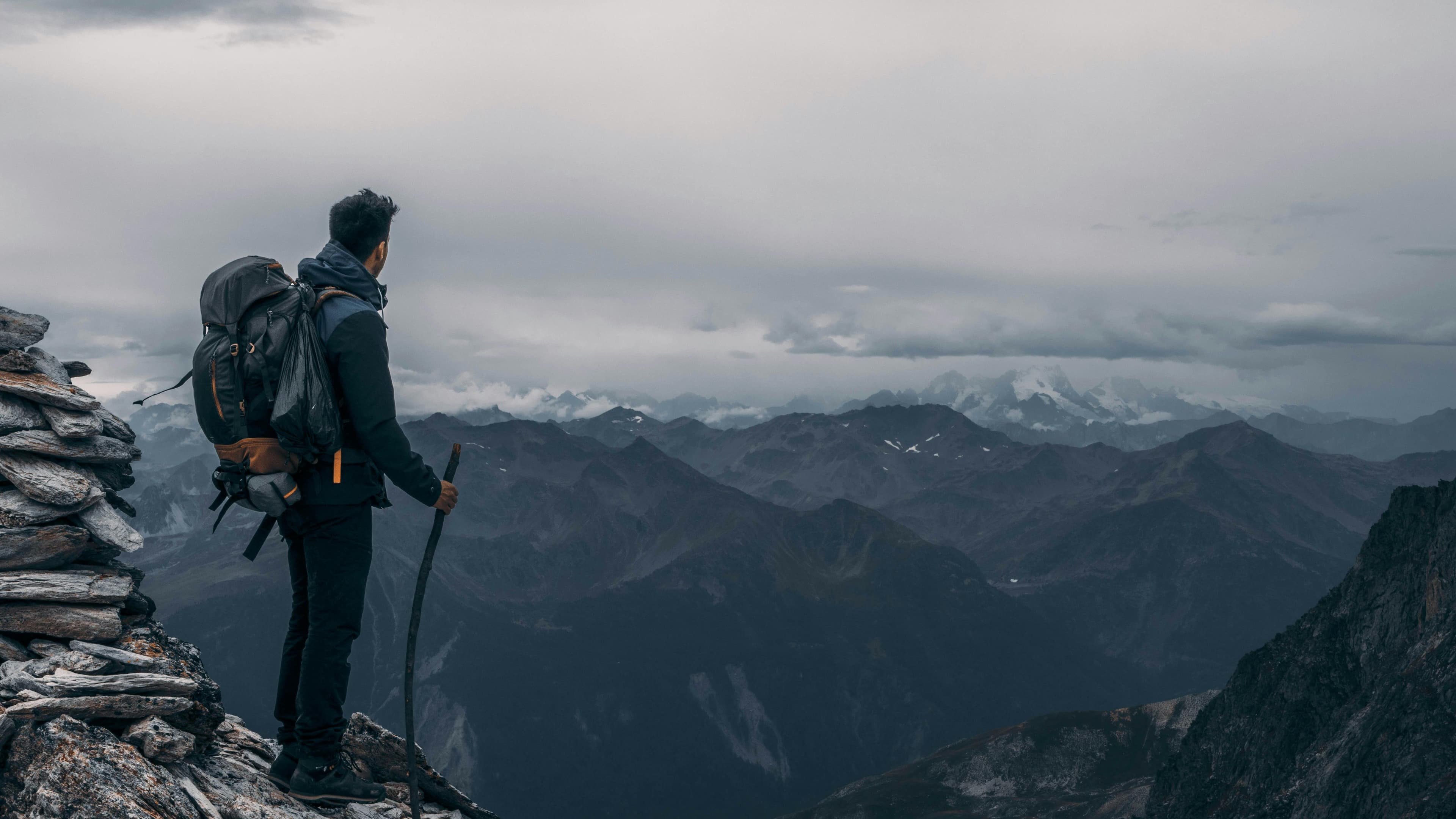 A hiker planning a route outdoors